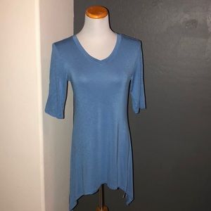 Logo by Lori Goldstein light blue top xs